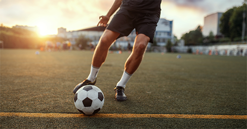 Henri jouant au soccer